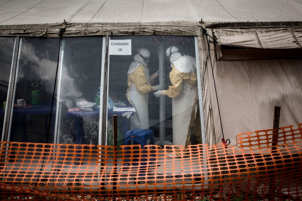 Health workers inside the “red zone” of an Ebola treatment center in Butembo, which was attacked on March 9. Health workers inside the