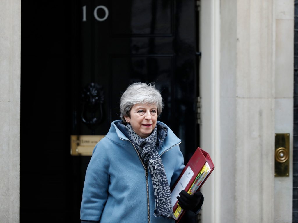 Britain’s Prime Minister Theresa May walks out 10 Downing street in London on Wednesday. She announced that if her Brexit deal is approved by Parliament, she will step down from her post. Britain's Prime Minister Theresa May walks out 10 Downing street in London on Wednesday. She announced that if her Brexit deal is approved by Parliament, she will step down from her post. (Adrian Dennis/AFP/Getty Images)