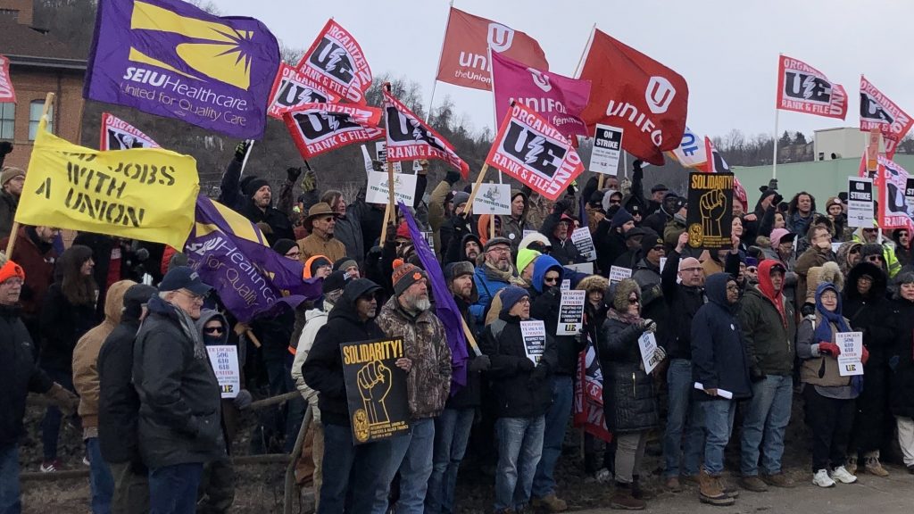 Union members and activists protest over contract negotiations with Wabtec Corporation in Wilmerding, Pa., on March 6. Many are workers from one of the company’s facilities in Erie County, which flipped from voting for Barack Obama to Donald Trump in 2016. Union members and activists protest over contract negotiations with Wabtec Corporation in Wilmerding, Pa., on March 6. Many are workers from one of the company's facilities in Erie County, which flipped from voting for Barack Obama to Donald Trump in 2016. (Don Gonyea/NPR)