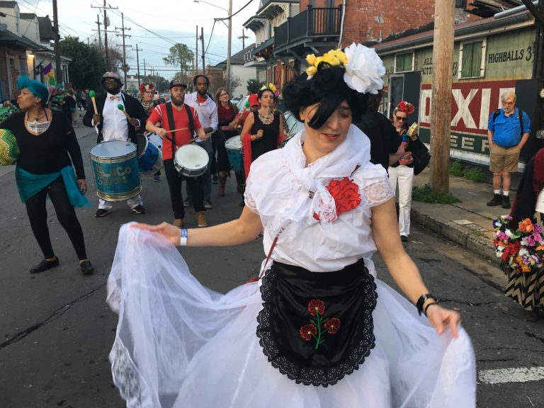 New Orleans resident Annie Gibson parades dressed as Frida Kahlo with Krewe de Mayahuel, a Mardi Gras krewe organized by the Mexican immigrant population in the city. (Adolfo Guzman-Lopez/KPCC)
