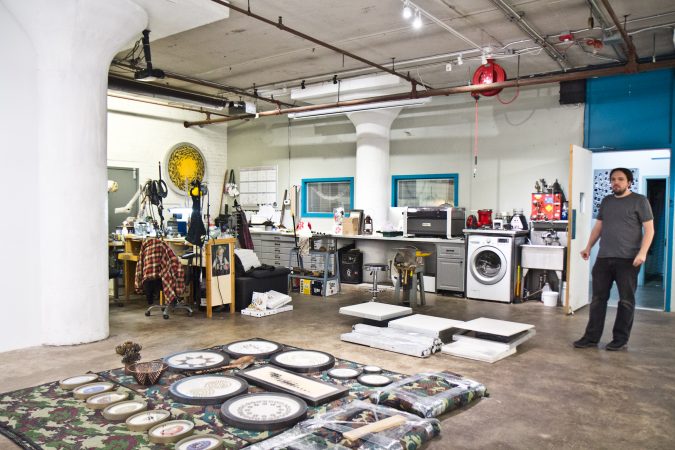 The living space of artists tacky Lee Webber and Joseph Leroux is attached to their studio spaces at the Globe Dye Works building. (Kimberly Paynter/WHYY)