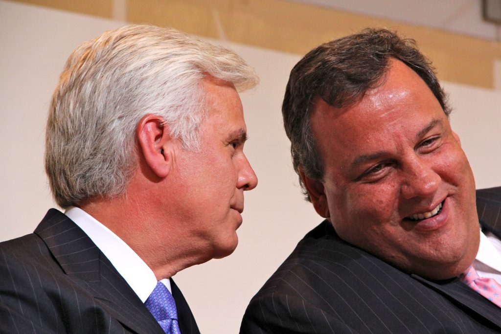 2012 07 24-e lee-george norcross chris christie-new jersey camden cooper medical center George Norcross III leans in to talk to New Jersey Gov. Chris Christie during an event at Cooper Medical Center in Camden, where Norcross is Chairman of the Board.