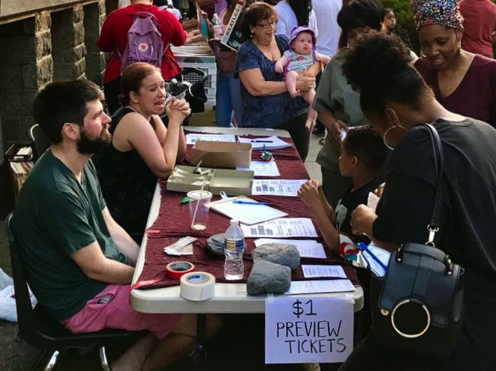 Curio Theatre Company sells $1 tickets at the Baltimore Avenue Dollar Stroll in June 2018. (Courtesy of Curio Theatre Co.)