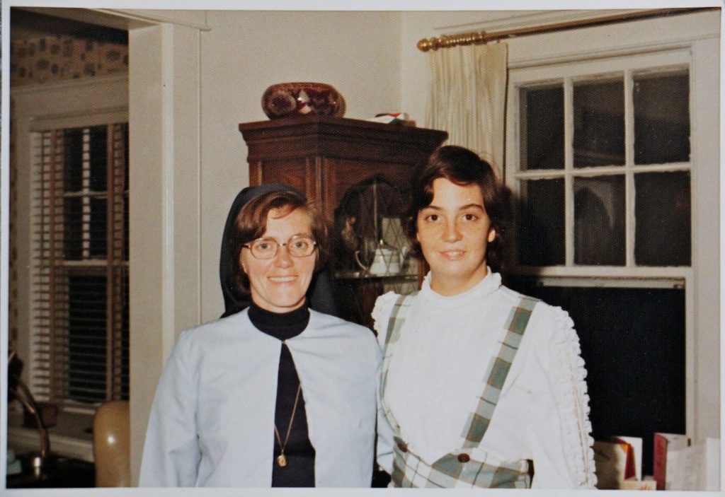 Patricia Cahill poses with sister Eileen at her parents' house in Ridgewood. The family were pleased and proud that the nun visited their house and that she took a special interest in Patricia. (Courtesy of Patricia Cahill)