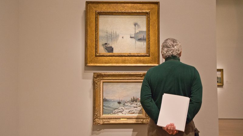 Paintings by Camille Pissarro at the “The Impressionist’s Eye” exhibit at the Philadelphia Museum of Art. (Kimberly Paynter/WHYY)