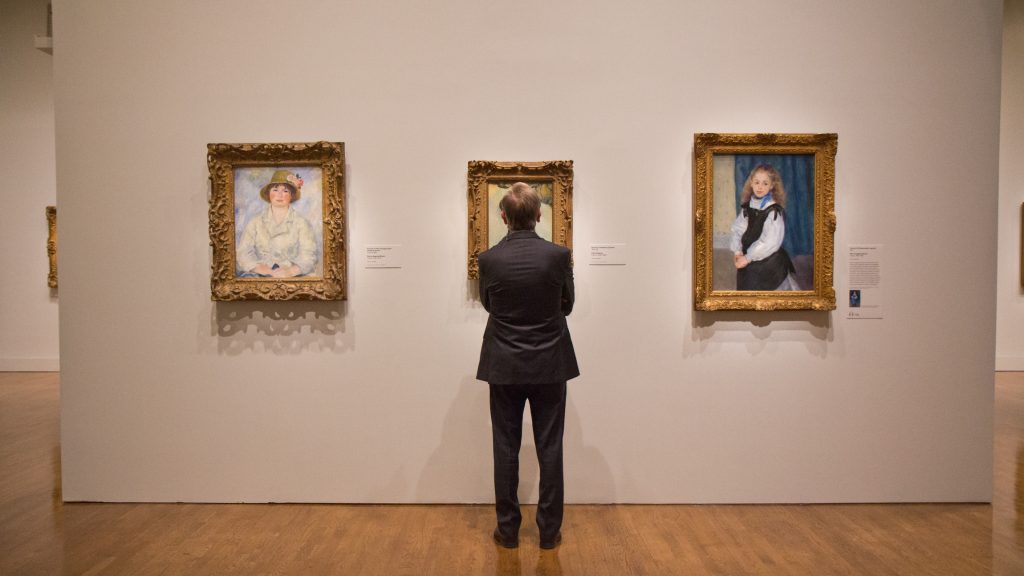 2019 04 11 impressionist’s eye philadelphia museum of art-8 A visitor admires impressionist portraits at “The Impressionist’s Eye” exhibit at the Philadelphia Museum of Art. (Kimberly Paynter/WHYY)
