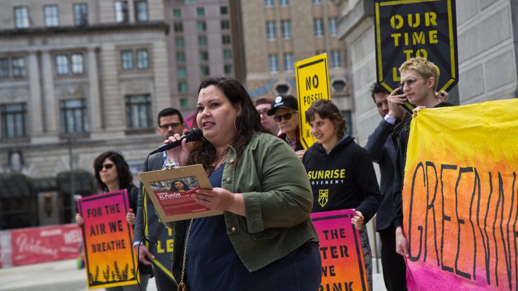 2019 04 15 green new deal protest city hall-6 At-large city council candidate Erica Almirón speaks at New Sunrise Movement’s New Green Deal Rally at City Hall Monday. (Kimberly Paynter/WHYY)