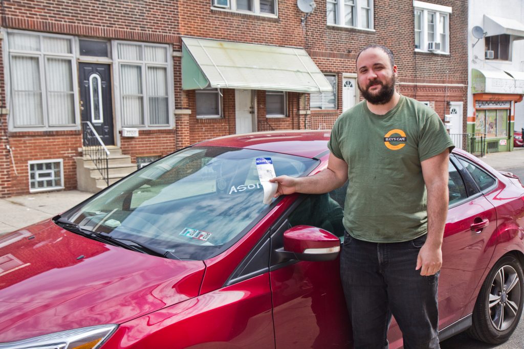 2019 04 17 parking tickets center city Mark Rascati has been a Philadelphia resident for 3 years. He delivers for Instacart and frequently runs into problems with parking and recently had his car towed. (Kimberly Paynter/WHYY)