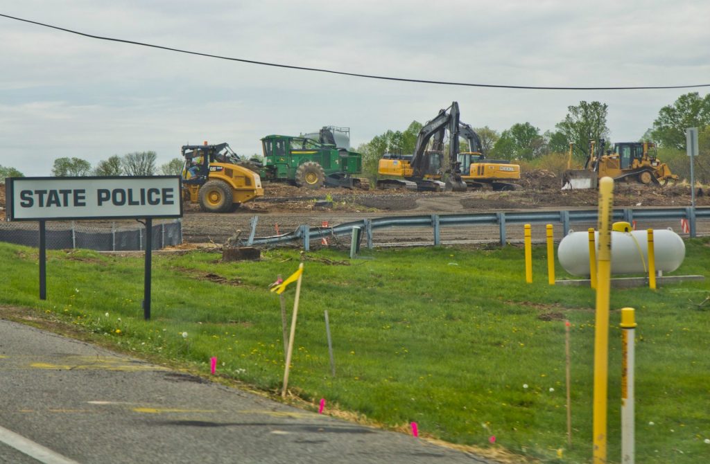 2019-04-25-next-to-state-police-3-1920×1256 Crews work at the site of a sinkhole along the Mariner East pipeline route near the Pennsylvania State Police barracks on Route 1 in Delaware County on Thursday, April 25, 2019. Pipeline builder said there were no leaks and no pipelines were exposed. (Kimberly Paynter / WHYY)