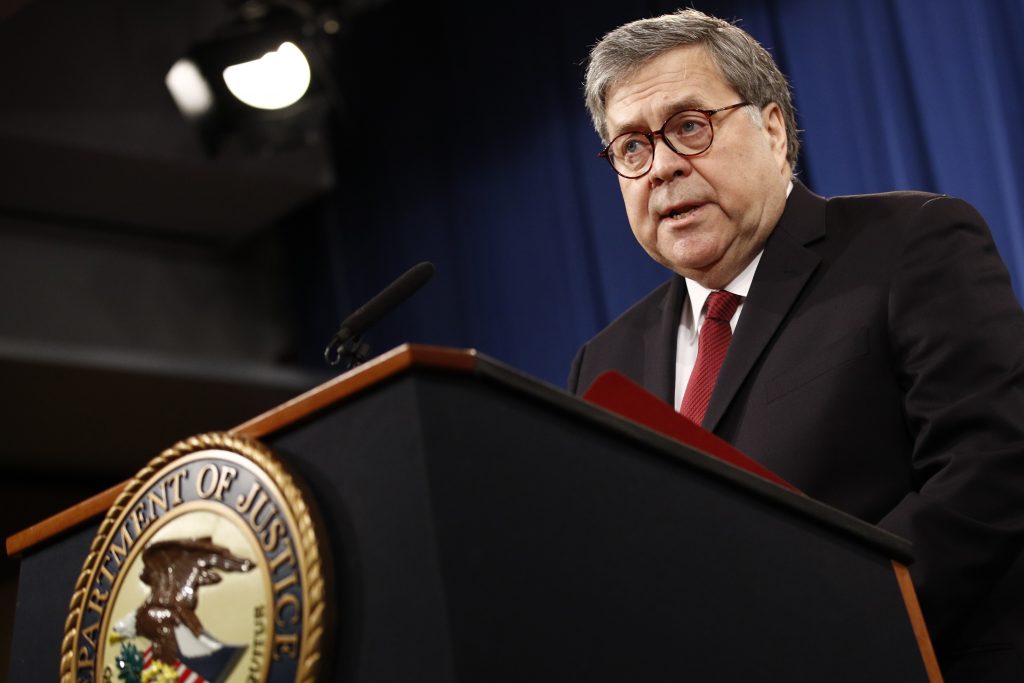 William Barr,Rod Rosenstein Then Attorney General William Barr at the Department of Justice in Washington in 2019. (Patrick Semansky/AP Photo)