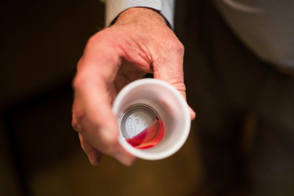 Opioids Treatment Medicare In this March 7, 2017, file photo, the CEO of a methadone clinic holds a 35 mg liquid dose of methadone. (Kevin D. Liles/AP Photo, File)