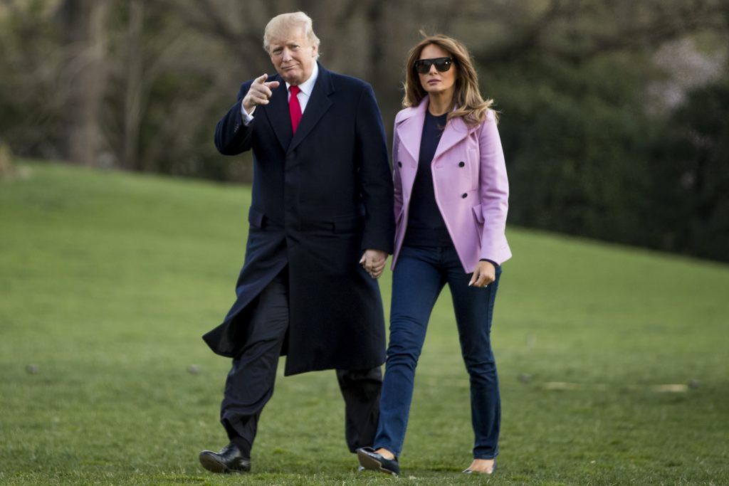 President Donald Trump and first lady Melania Trump walk along the South Lawn of the White House in Washington, Sunday, March 31, 2019, as they return from Trump's Mar-a-Lago estate in Palm Beach, Fla. (Andrew Harnik/AP Photo)