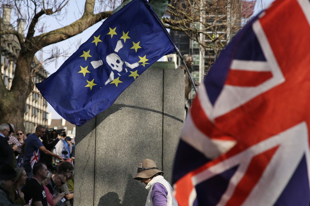 Brexit Whats Next In this March 29, 2019, file photo, Pro-Brexit leave the European Union supporters wave flags in Parliament Square at the end of the final leg of the