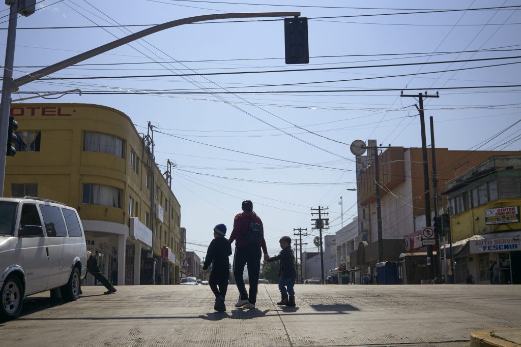 United States Mexico Asylum In this March 5, 2019 file photo, Ruth Aracely Monroy walks with her sons in Tijuana, Mexico. After requesting asylum in the United States, the family was returned to Tijuana to wait for their hearing in San Diego. (Gregory Bull/AP Photo)