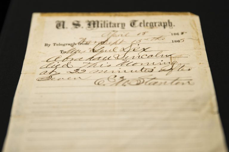This photo shows a handwritten notification of President Abraham Lincoln's death that is being offered for sale by Raab Collection in Ardmore, Pa., Thursday, April 11, 2019. The telegram was written inside a home where Lincoln was rushed after being shot at Ford's Theater on April 14, 1865. (Matt Rourke/AP Photo)