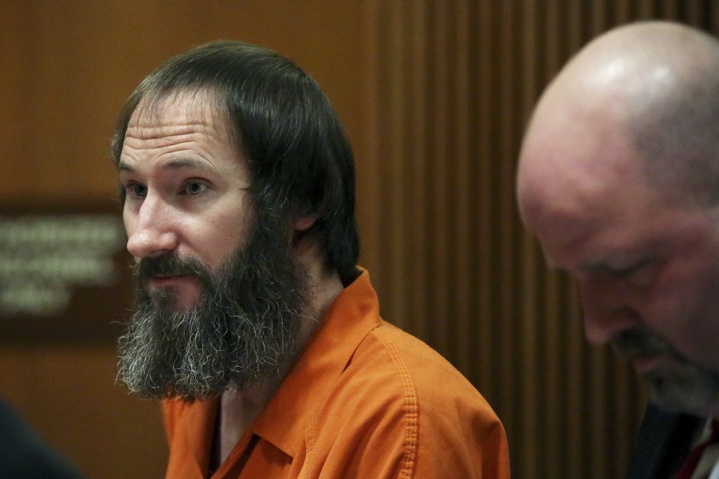 Helpful Homeless Man Johnny Bobbitt stands in the courtroom during his sentencing hearing at Burlington County Superior Court in Mount Holly, N.J., Friday, April 12, 2019. Bobbitt, the homeless veteran who admitted to conspiring with a New Jersey couple in a GoFundMe scam that raised more than $400,000, was sentenced Friday to five years' probation. (Tim Tai/The Philadelphia Inquirer via AP, Pool)