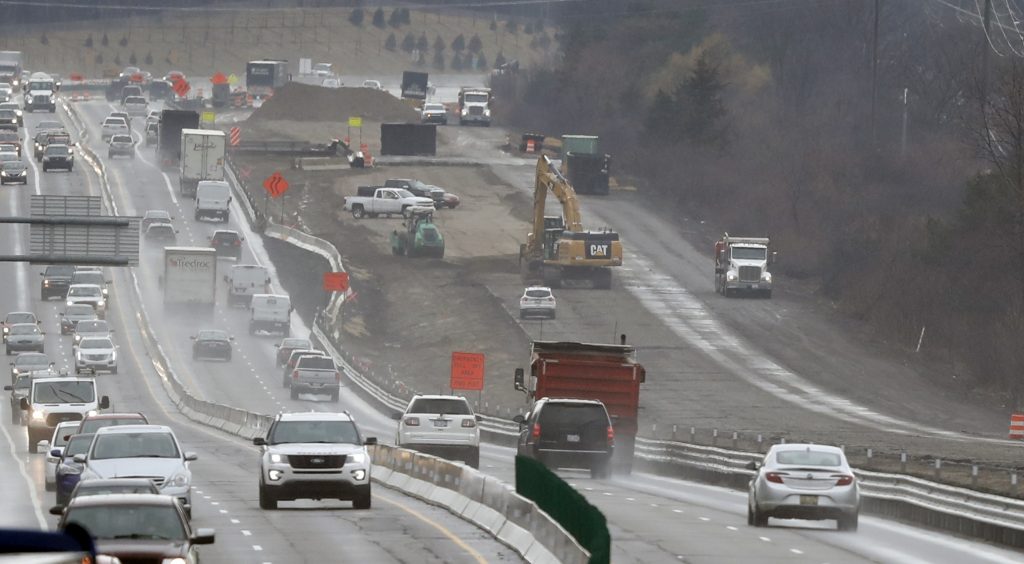Road Funding States In a Friday, April 12, 2019 photo, Interstate Highway 75 construction continues in Troy, Mich. After passing waves of tax cuts in recent years, some Republican-dominated states have decided it's time to make a big exception, calling for tax increases to fix roads crumbling from years of low funding and deferred maintenance. (Carlos Osorio/AP Photo)