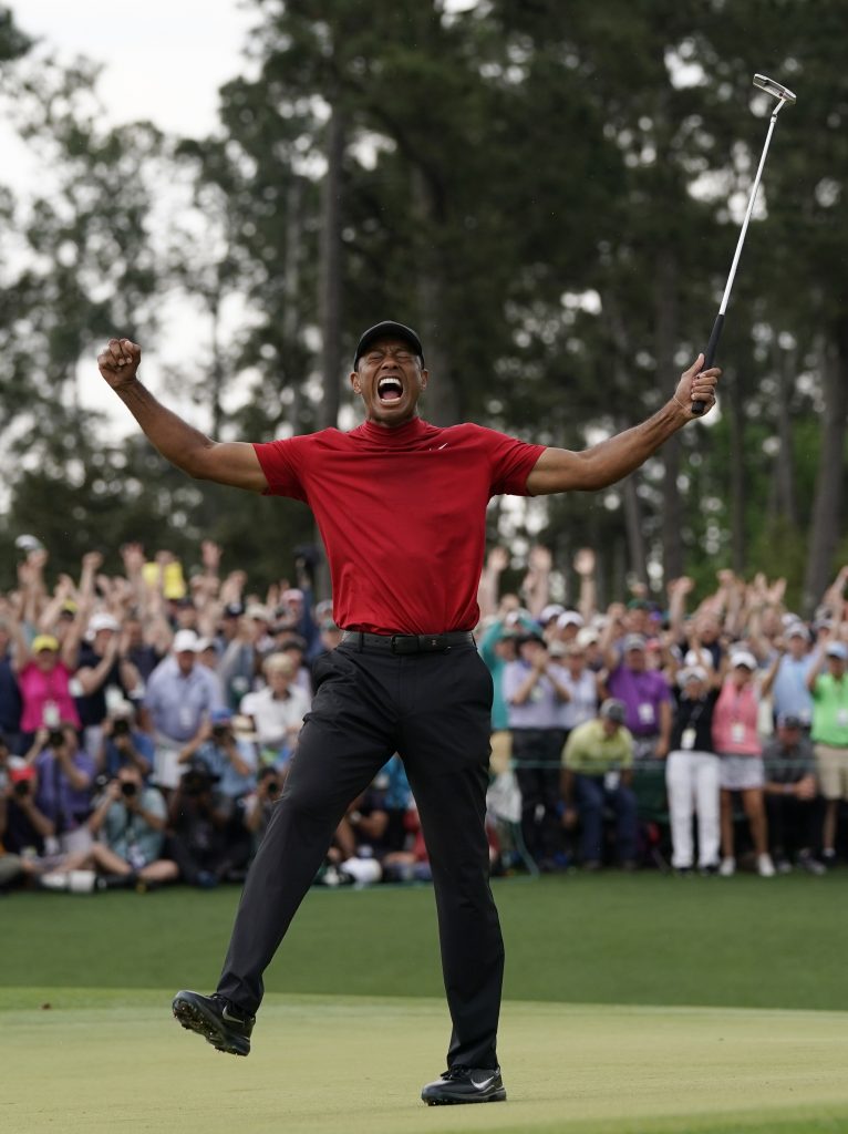 APTOPIX Masters Golf Tiger Woods reacts as he wins the Masters golf tournament Sunday, April 14, 2019, in Augusta, Ga. (David J. Phillip/AP Photo)