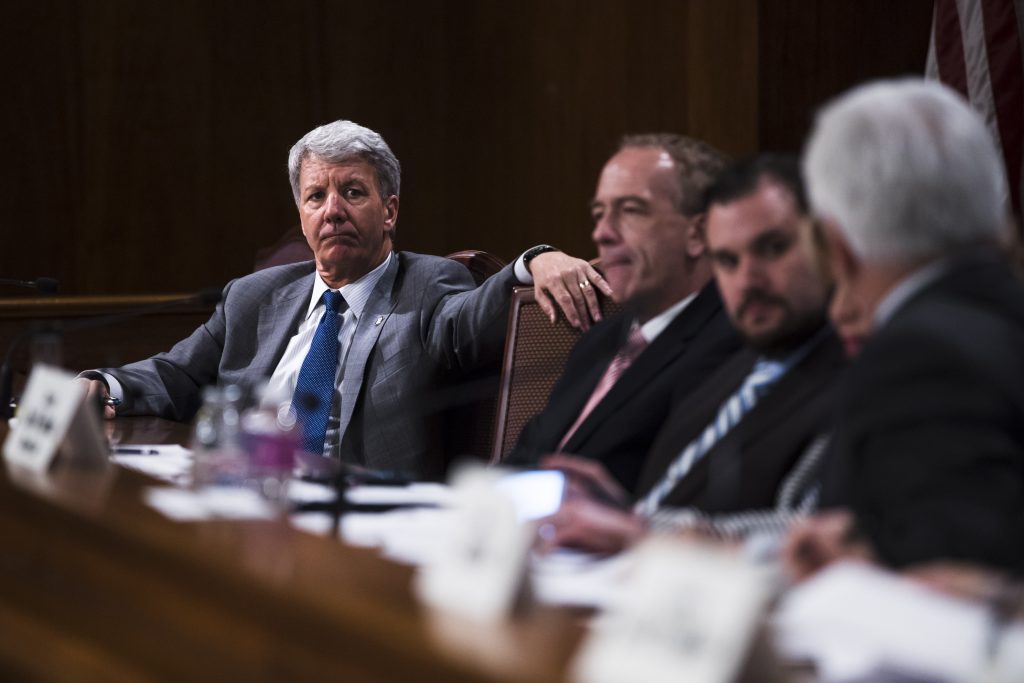 In this Wednesday, April 10, 2019, Tom Killion, R-Delaware, attends a hearing at the state Capitol in Harrisburg, Pa. After Democrats flipped six state Senate seats in the suburbs of Philadelphia and Pittsburgh, Killion is practically the chamber's last Republican standing in those areas and target No. 1 for Democrats in 2020. (Matt Rourke/AP Photo)