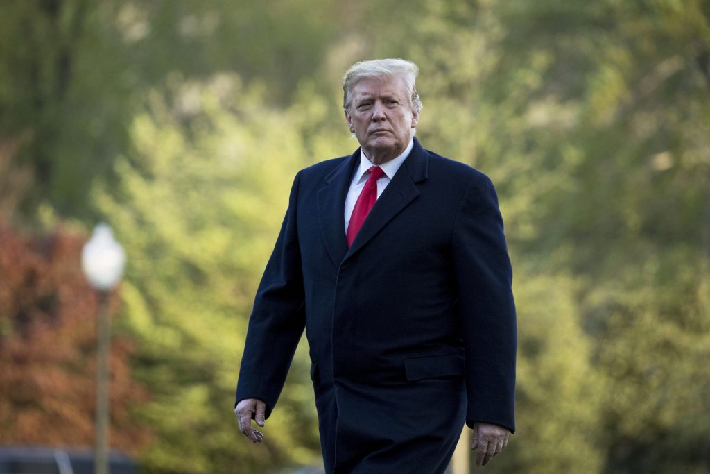 Donald Trump President Donald Trump walks on the South Lawn as he arrives at the White House in Washington. Trump on Tuesday vetoed a resolution passed by Congress to end U.S. military assistance in Saudi Arabia's war in Yemen. (AP Photo/Andrew Harnik, File)