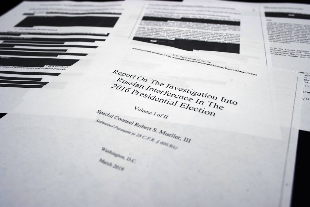 APTOPIX Trump Russia Probe Four pages of special counsel Robert Mueller report on the witness table in the House Intelligence Committee hearing room on Capitol Hill, in Washington, Thursday, April 18, 2019. (Cliff Owen/AP Photo)