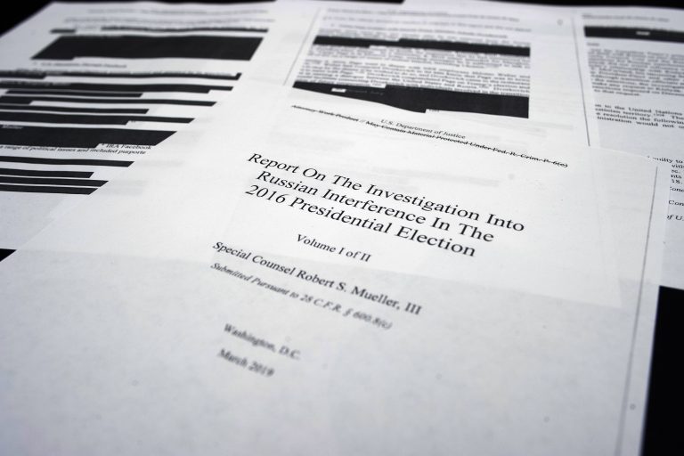 Four pages of special counsel Robert Mueller report on the witness table in the House Intelligence Committee hearing room on Capitol Hill, in Washington, Thursday, April 18, 2019. (Cliff Owen/AP Photo)