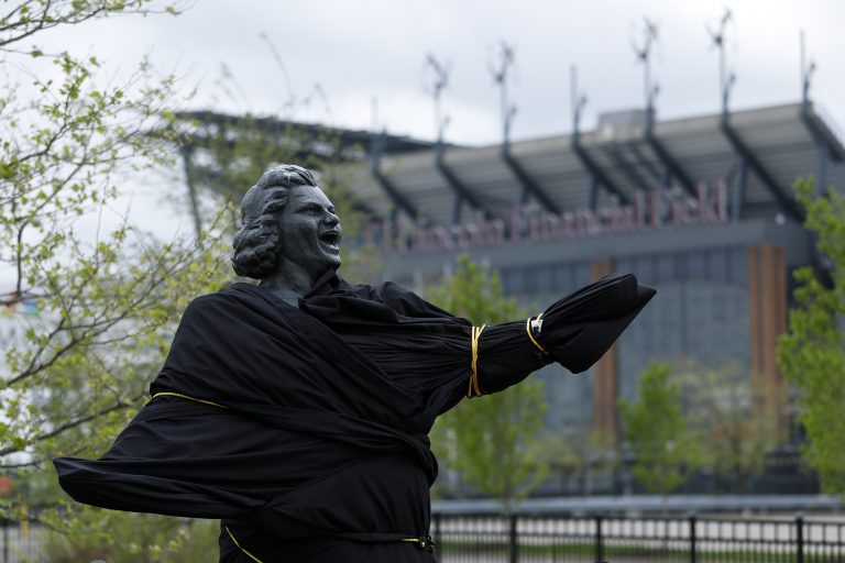 A partially covered statue of singer Kate Smith is seen near the Wells Fargo Center, Friday, April 19, 2019, in Philadelphia. The Philadelphia Flyers covered the statue of singer Kate Smith outside their arena, following the New York Yankees in cutting ties and looking into allegations of racism against the 1930s star with a popular recording of 