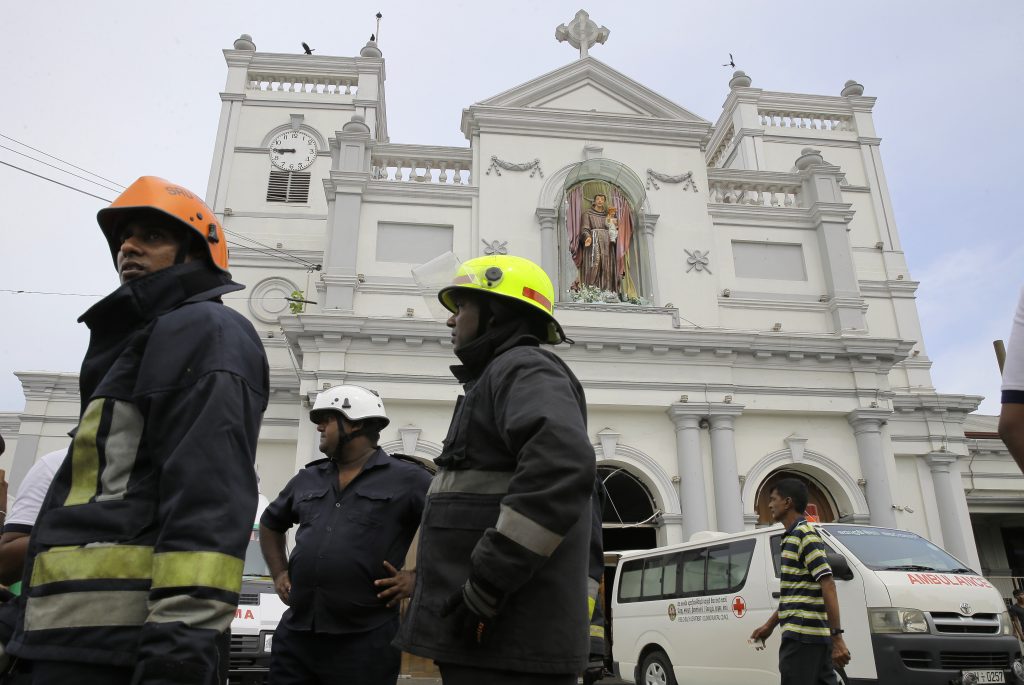 Sri Lanka Church Blasts Sri Lankan firefighters stand in the area around St. Anthony's Shrine after a blast in Colombo, Sri Lanka, Sunday, April 21, 2019. Witnesses are reporting two explosions have hit two churches in Sri Lanka on Easter Sunday, causing casualties among worshippers. (Eranga Jayawardena/AP Photo)
