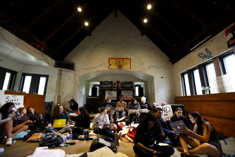Swarthmore College students gather at the Phi Psi fraternity house during a sit-in, Monday, April 29, 2019, in Swarthmore, Pa. (AP Photo)