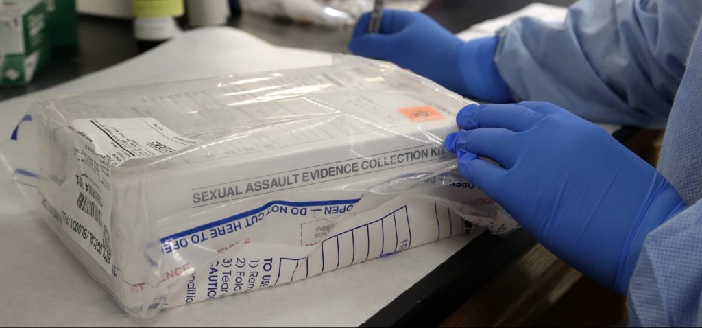AP_735489911862-e1555023842128-1920×897 A sexual assault evidence kit is logged in in the biology lab at the Houston Forensic Science Center Thursday, April 2, 2015, in Houston. (Pat Sullivan/AP Photo)