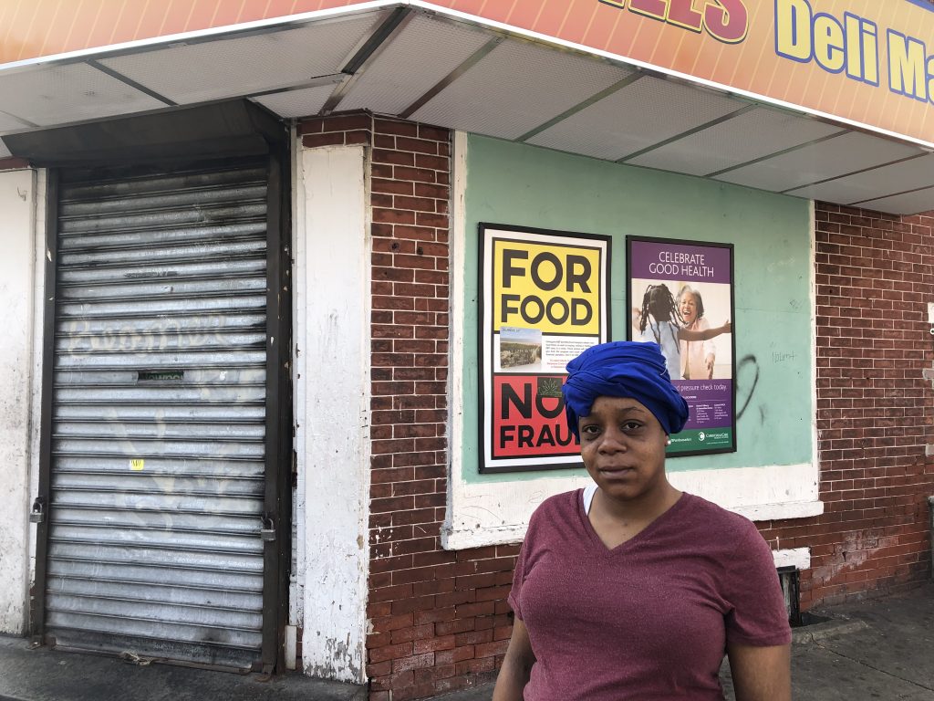 Brown Aamirah Brown said the operators of Bill’s Deli Mart should better control crowds after six people were shot outside the market Sunday. (Cris Barrish/WHYY)