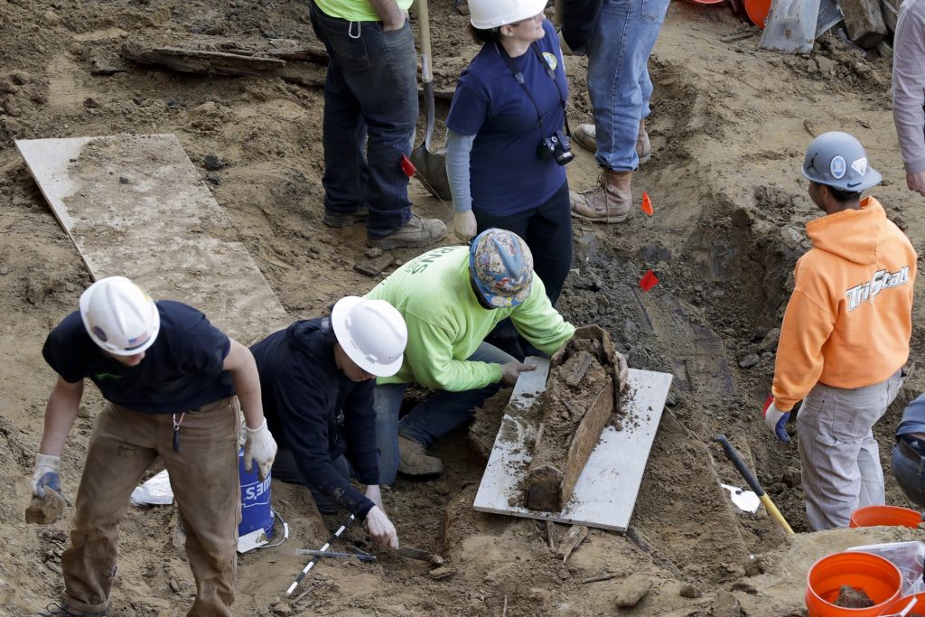 Construction Site Coffins Found Workers excavate a coffin from a construction site in the Old City neighborhood, Thursday, March 9, 2017, in Philadelphia. Crews working on an apartment building in Philadelphia's historic district got a shock last month when their backhoes started hitting coffins and unearthing fully intact human remains. The site was supposed to be a former burial ground from 1707, and all remains were supposedly exhumed in the 1800s and moved to a different cemetery. (AP Photo/Matt Slocum)