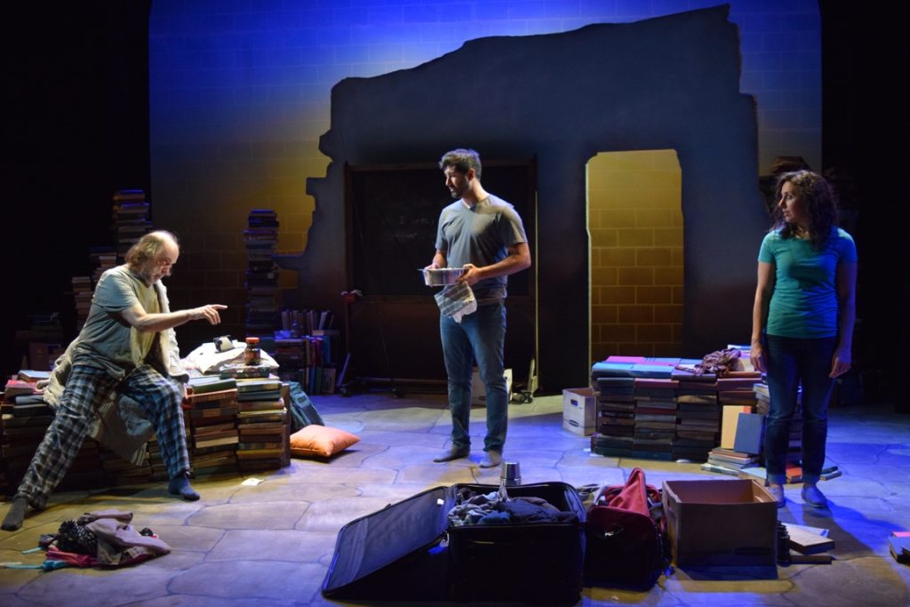 HEARTLAND art Tim Moyer (left) as the professor, Yousof Sultani as Nazrullah, and Nazli Sarpkaya as Getee in InterAct Theatre Company's production of