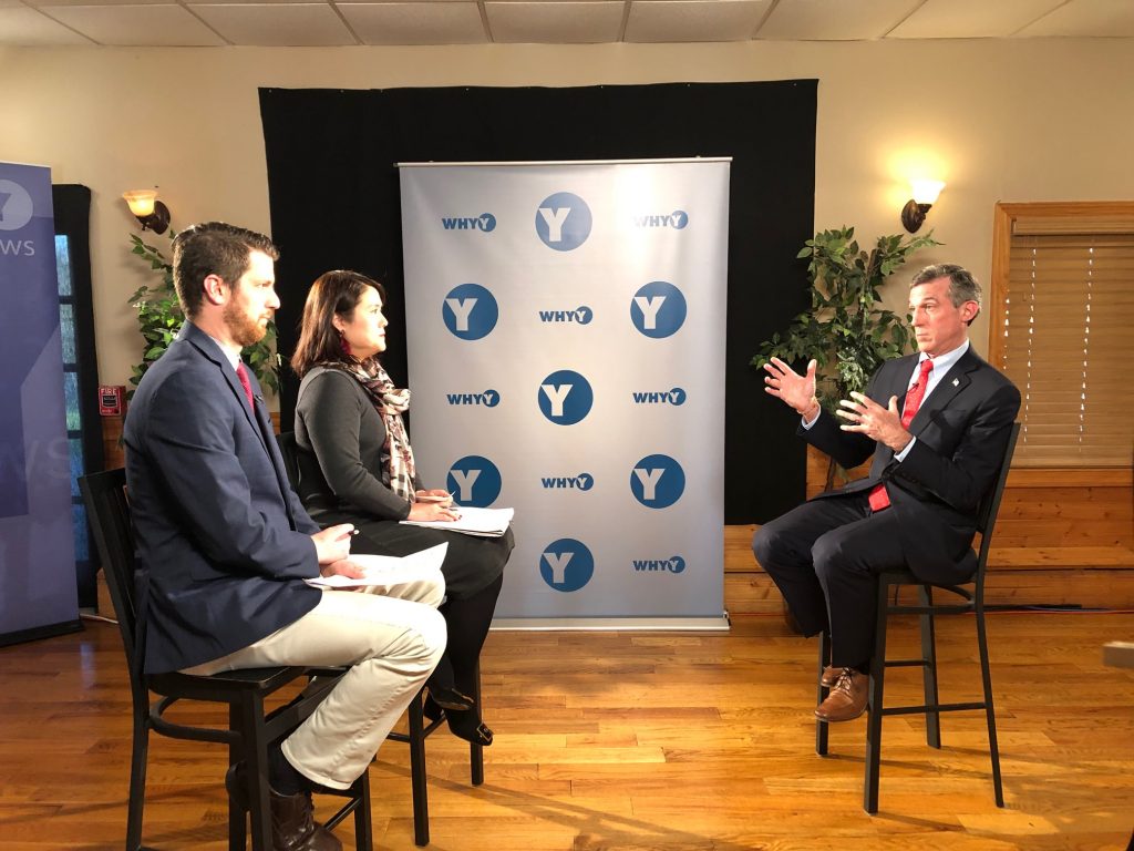 Carney with Eichmann and Min Gov. John Carney at Wedneday's town hall hosted by WHYY. At left is WHYY's Mark Eichmann and Shirley Min. (Cris Barrish/WHYY)