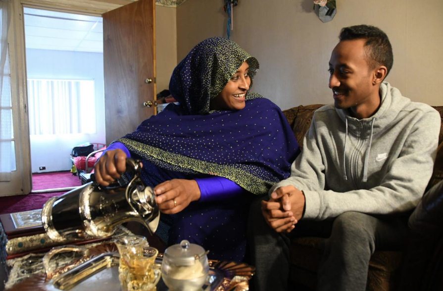 Screen Shot 2019-04-16 at 1.32.46 PM Sawsan Ali, left, and son Maaz Mohammed celebrate the fall of Sudanese leader Omar Al-Bashir. (Abdul R. Sulayman/The Philadelphia Tribune)