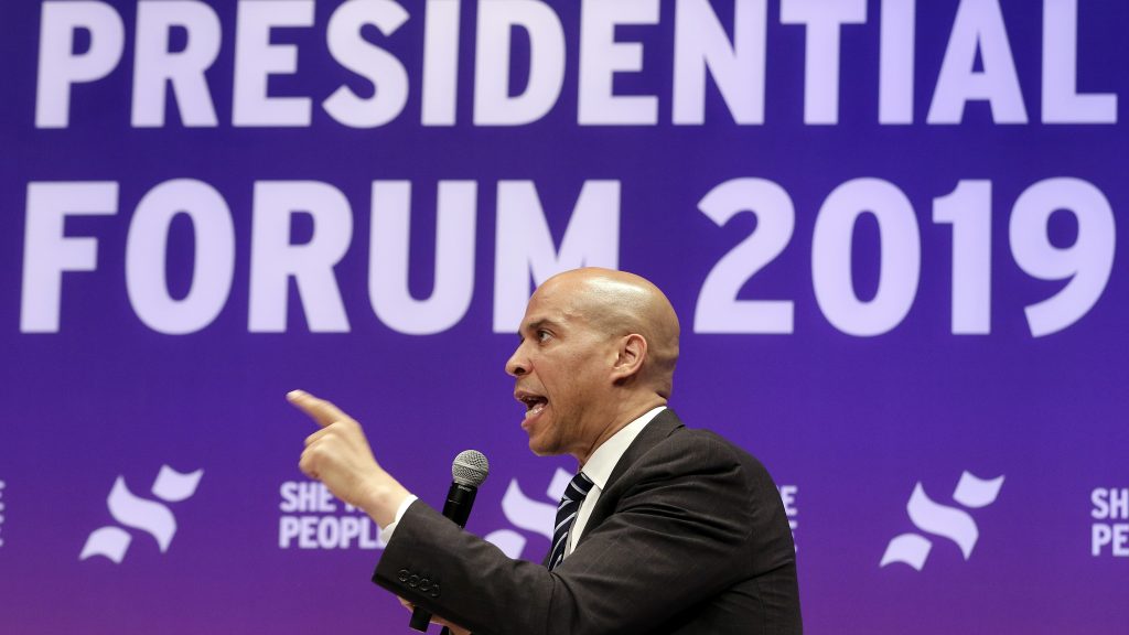 Sen. Cory Booker, D-N.J., answers questions during a presidential forum held by She The People in Houston on Wednesday. Sen. Cory Booker, D-N.J., answers questions during a presidential forum held by She The People in Houston on Wednesday.
(Michael Wyke/AP)