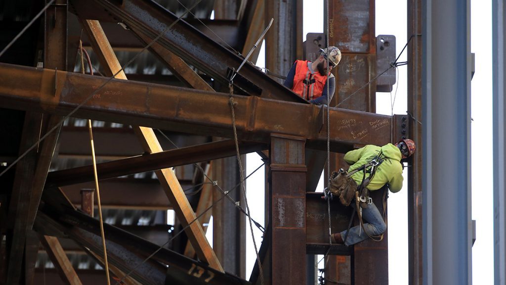 ap_777408450832_crop-1024×576 Iron workers help build the Comcast Innovation and Technology Center in Philadelphia. (Matt Rourke/AP Photo)