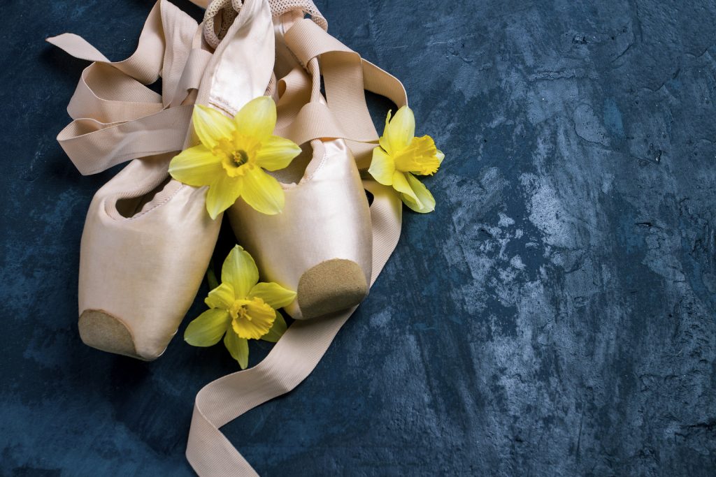 Ballerina Shoes, Pointe Shoes Without People On A Blue Backgroun Ballerina shoes (Photo Courtesy/BigStock)