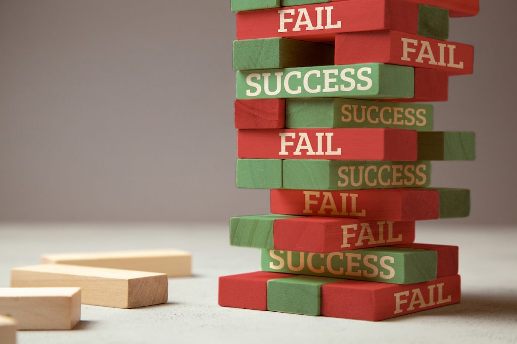 Success And Fail. Wooden Tower Of Blocks. Failure Is Like A New Step For Success. Failure Gives Expe Image: ADragan