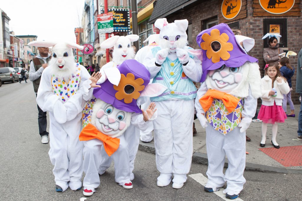 easter promenade (4 of 165) (1) People dressed as Easter bunnies pose for a photo.