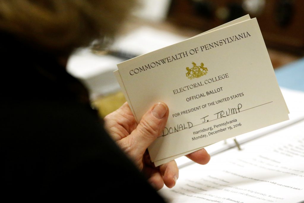 Welsh holds her ballot for U.S. President-elect Donald Trump before casting it at the Pennsylvania State Capitol in Harrisburg, Pennsylvania A Pennsylvania elector holds her ballot for President-elect Donald Trump before casting it in December 2016. (Jonathan Ernst/Reuters)