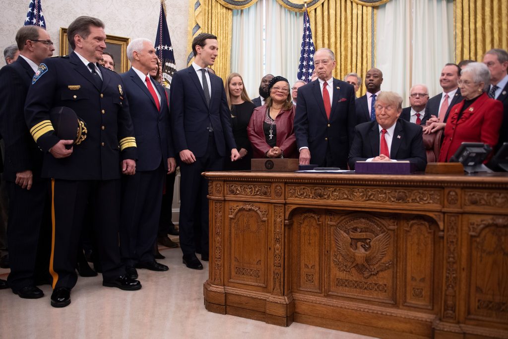 President Trump at the signing ceremony for the First Step Act in December. While some prisoners are benefiting from reduced sentences, implementation of other aspects of the law has been hit with delays. President Trump at the signing ceremony for the First Step Act in December. While some prisoners are benefiting from reduced sentences, implementation of other aspects of the law has been hit with delays.
(Jim Watson/AFP/Getty Images)
