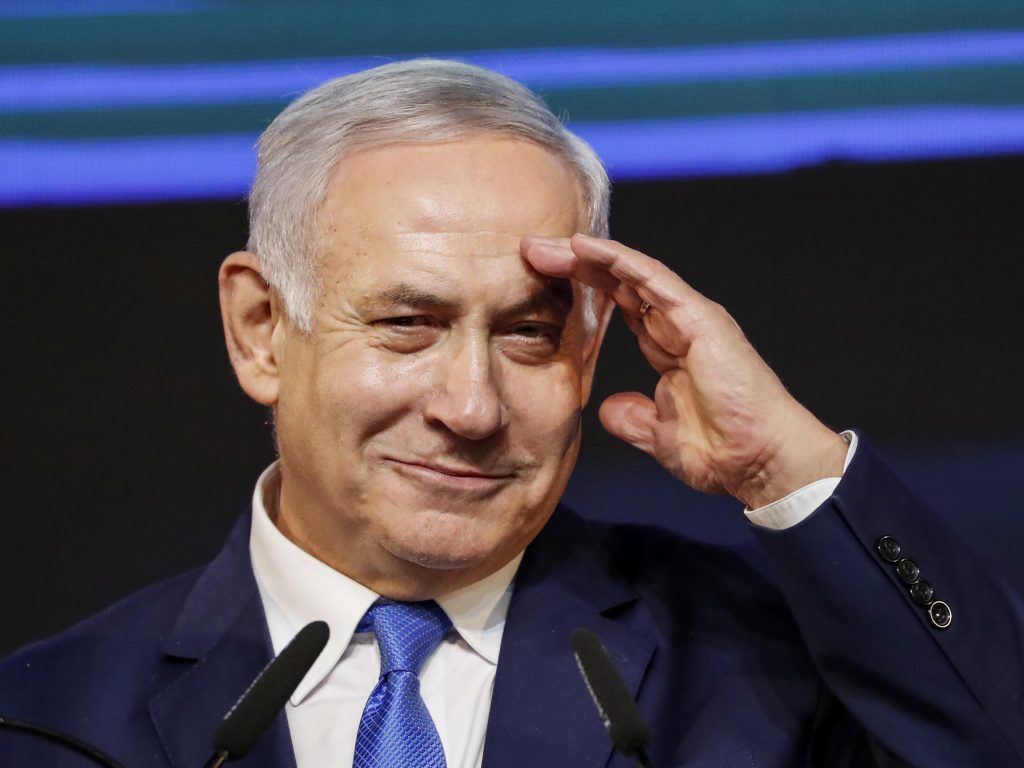 Israeli Prime Minister Benjamin Netanyahu gestures as he addresses supporters at his Likud Party headquarters in Tel Aviv on election night early on Wednesday. Israeli Prime Minister Benjamin Netanyahu gestures as he addresses supporters at his Likud Party headquarters in Tel Aviv on election night early on Wednesday. (Thomas Coex/AFP/Getty Images)