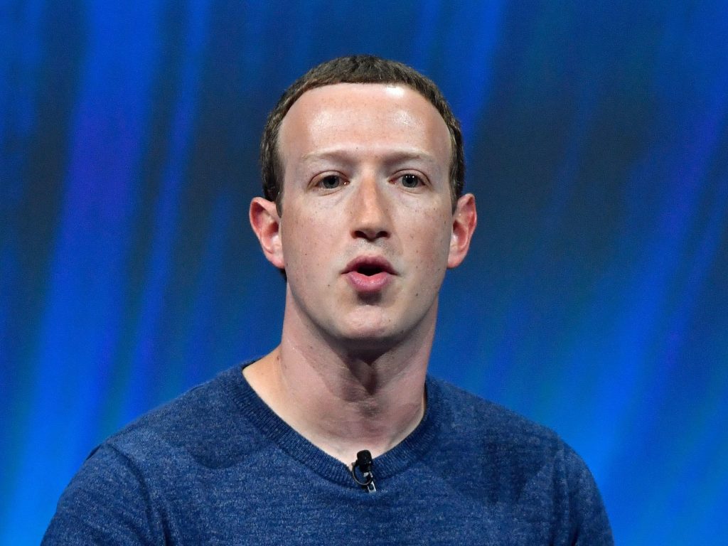 Facebook’s CEO Mark Zuckerberg speaks at a trade fair in 2018. The company says it will use artificial intelligence to figure out which of its users have died. Facebook's CEO Mark Zuckerberg speaks at a trade fair in 2018. The company says it will use artificial intelligence to figure out which of its users have died.