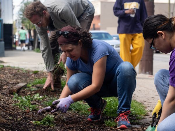 Jessica Noon, a former volunteer for La Finquita, has been organizing community building days for a new garden on Orkney street. (Angela Gervasi for WHYY)