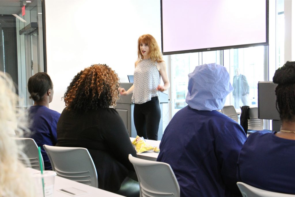 2019 04 29-e lee-jennifer otoole-philadelphia naval yard jefferson health-treating the neurological spectrum Jennifer O'Toole gives a talk about living with autism to a group of health professionals at Jefferson Health's Navy Yard facility. (Emma Lee/WHYY)
