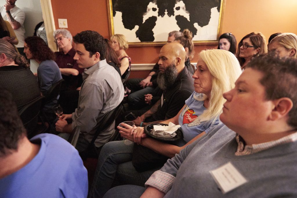 2019 05 10-n piserchio-philadelphia pa-friends of safehouse event 3 A group of doctors, lawers, friends, and family gather at the home of Marissa Perrone and Joe Piscitello, where they host the Friends of Safehouse event on Friday, May 10, 2019. (Natalie Piserchio for WHYY)