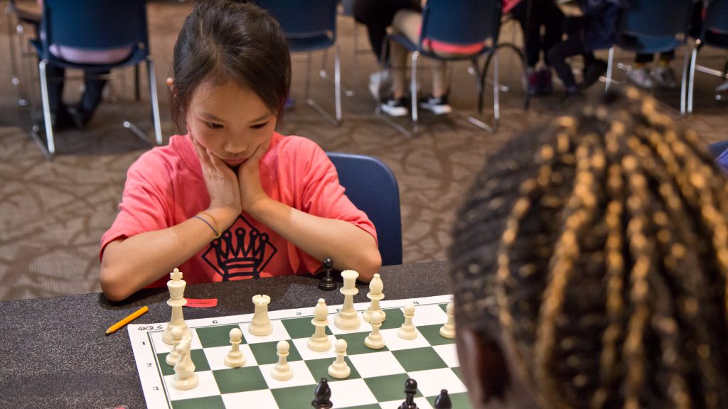 2019 05 14 philly girls play chess-6 Sharon Suardi, 8, contemplates her next move at the ASAP Philly Girls Play Chess tournament. (Kimberly Paynter/WHYY)