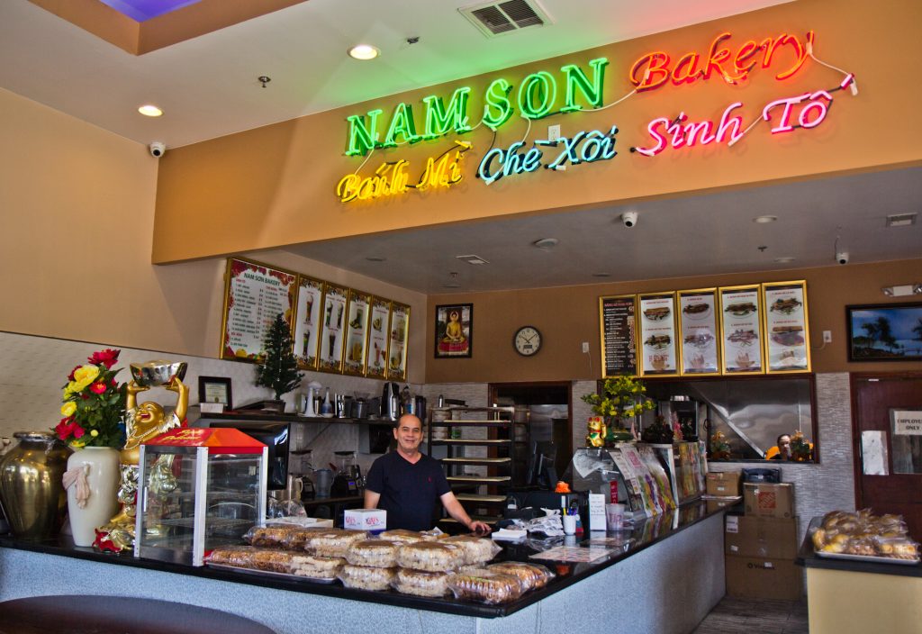 2019 05 22 nam son bakery south philadelphia-2 The owner of Nam Son Bakery behind the counter of the South Philadelphia shop. (Kimberly Paynter/WHYY)