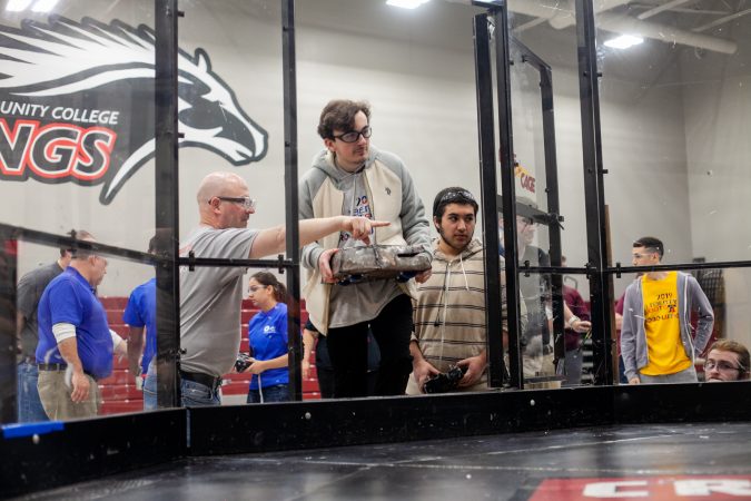 The team from Quakertown High School bring their robot in to the 